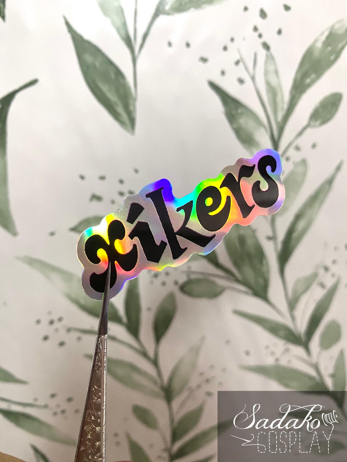xikers Logo Vinyl Sticker mit Holo-Laser-Effekt