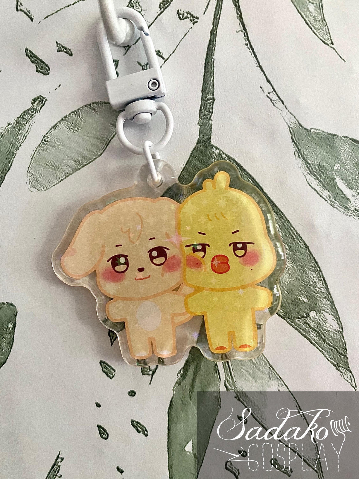 ATEEZ „Aniteez Couple“ Acrylic Keychain mit Glitzer Sternen - Seongjoong, Yungi, WooSan, JongSang